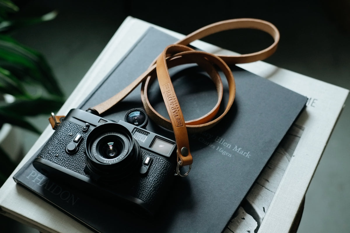 tan camera strap